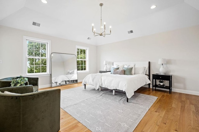 17 Arrowhead Ln, Westborough, MA 01581 - bedroom with a chandelier, light wood finished floors, vaulted ceiling, and recessed lighting