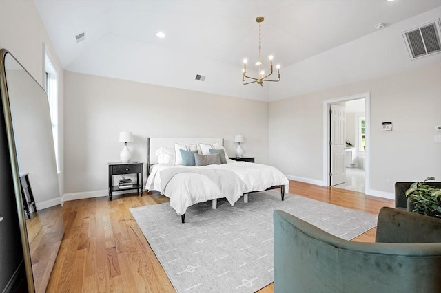 17 Arrowhead Ln, Westborough, MA 01581 - bedroom featuring a chandelier, light wood finished floors, and vaulted ceiling