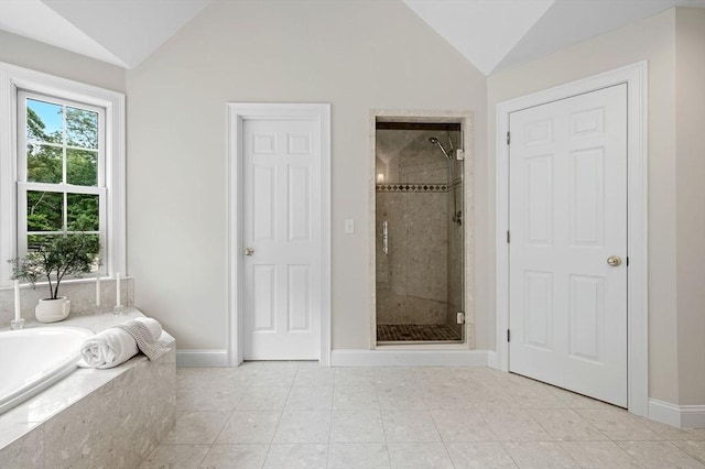 17 Arrowhead Ln, Westborough, MA 01581 - full bath with vaulted ceiling, a stall shower, a bath, and tile patterned flooring