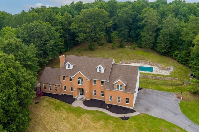 17 Arrowhead Ln, Westborough, MA 01581 - view of subject property with a heavily wooded area and a pool
