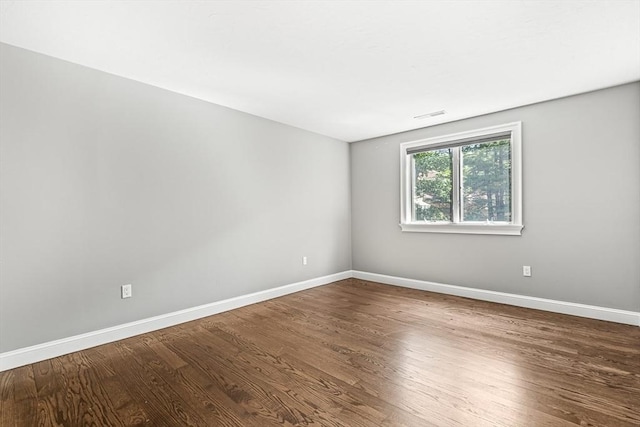 7 Wainwright Rd Unit 55, Winchester, MA 01890 - unfurnished room with wood finished floors and baseboards