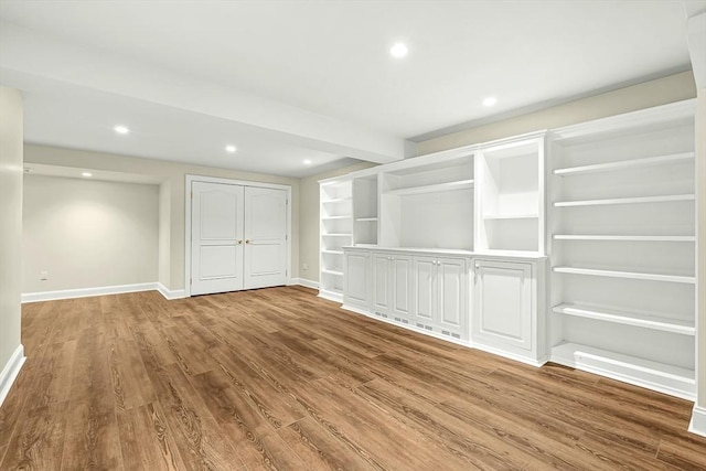 7 Wainwright Rd Unit 55, Winchester, MA 01890 - spare room featuring wood finished floors, recessed lighting, and baseboards