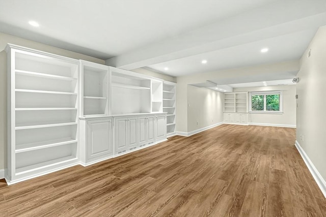 7 Wainwright Rd Unit 55, Winchester, MA 01890 - unfurnished room featuring wood finished floors, baseboards, recessed lighting, and built in features