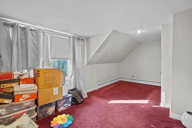 bonus room featuring baseboard heating, lofted ceiling, and carpet floors