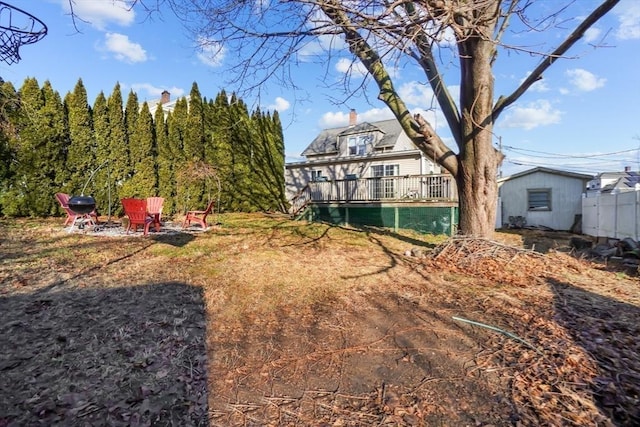 view of yard featuring a deck