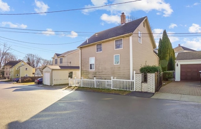 view of property exterior with a garage