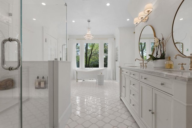 full bathroom with plenty of natural light, vanity, a shower stall, and recessed lighting