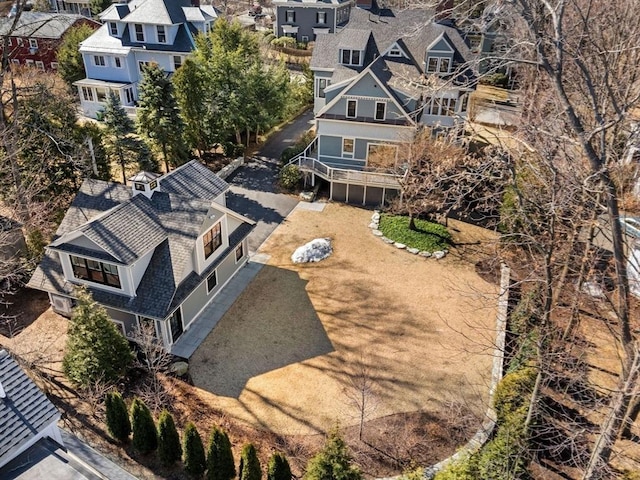 birds eye view of property with a residential view