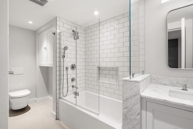 full bathroom with visible vents, baseboards, toilet, shower / bathing tub combination, and vanity