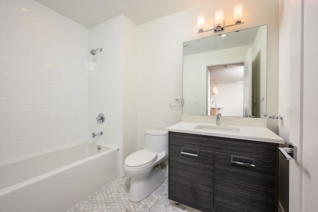 bathroom featuring tile patterned floors, shower / bathtub combination, vanity, and toilet