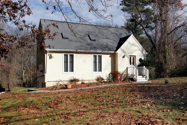 view of new england style home