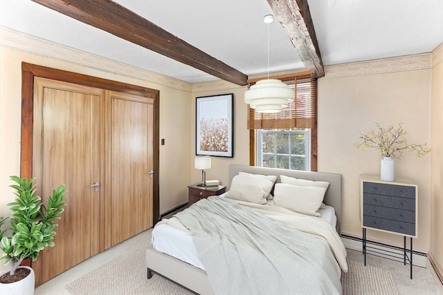 bedroom featuring beamed ceiling