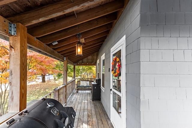 wooden terrace featuring area for grilling