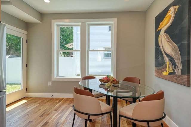 238 Sycamore St Unit 238, Watertown, MA 02472 - dining room with plenty of natural light, light wood finished floors, baseboards, and recessed lighting