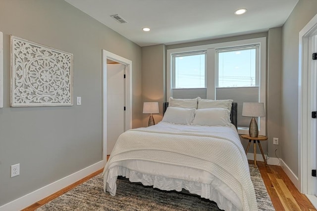 238 Sycamore St Unit 238, Watertown, MA 02472 - bedroom featuring light wood-style floors, baseboards, and recessed lighting