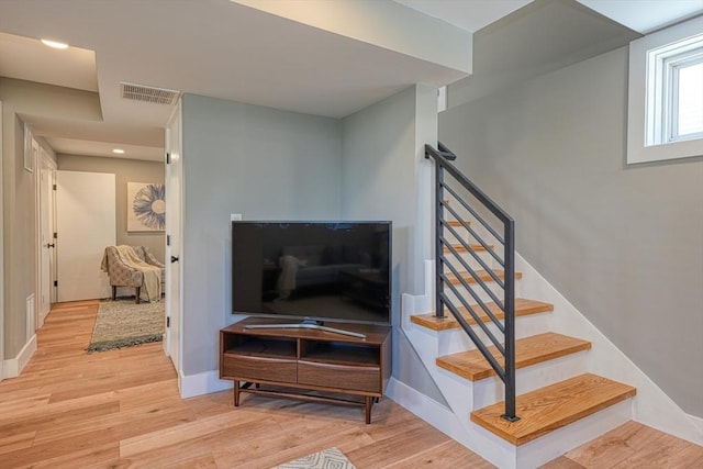 238 Sycamore St Unit 238, Watertown, MA 02472 - stairway with wood finished floors, baseboards, and recessed lighting