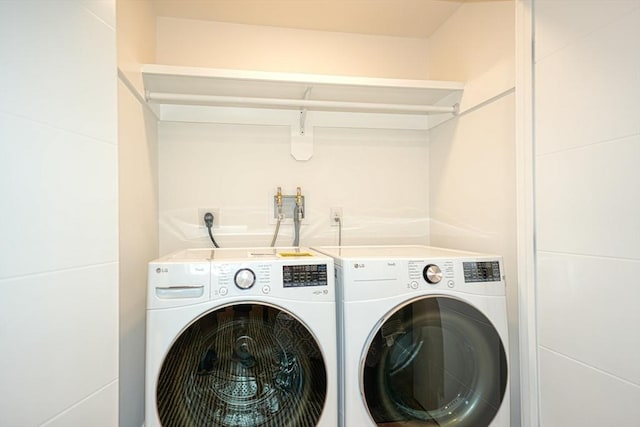238 Sycamore St Unit 238, Watertown, MA 02472 - washroom with washing machine and clothes dryer