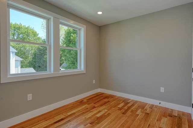 238 Sycamore St Unit 238, Watertown, MA 02472 - spare room with baseboards, light wood finished floors, and recessed lighting