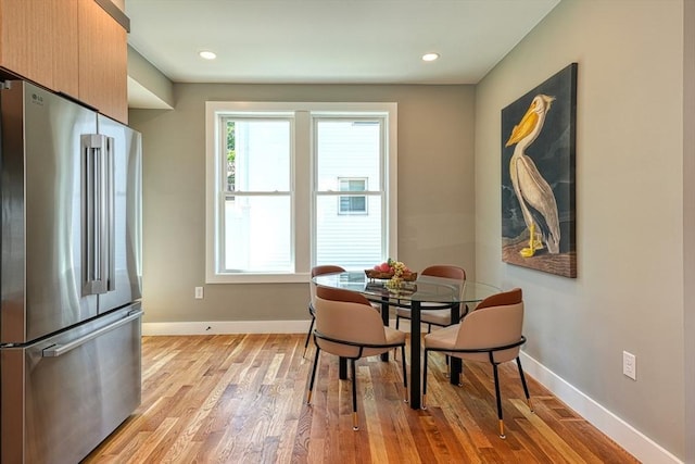 238 Sycamore St Unit 238, Watertown, MA 02472 - dining area with light wood finished floors, baseboards, and recessed lighting