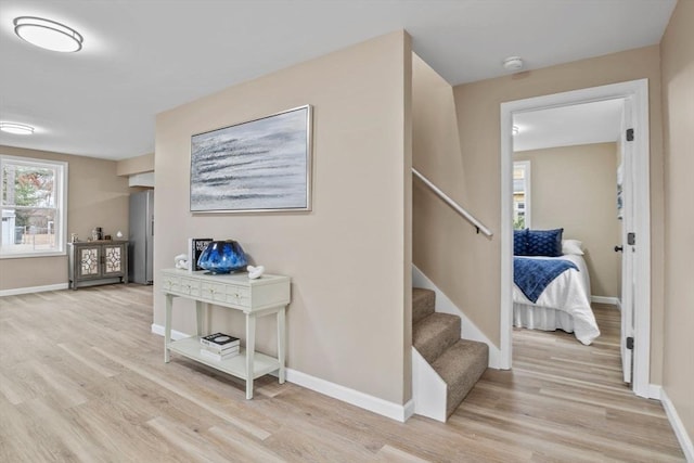 stairs with wood-type flooring