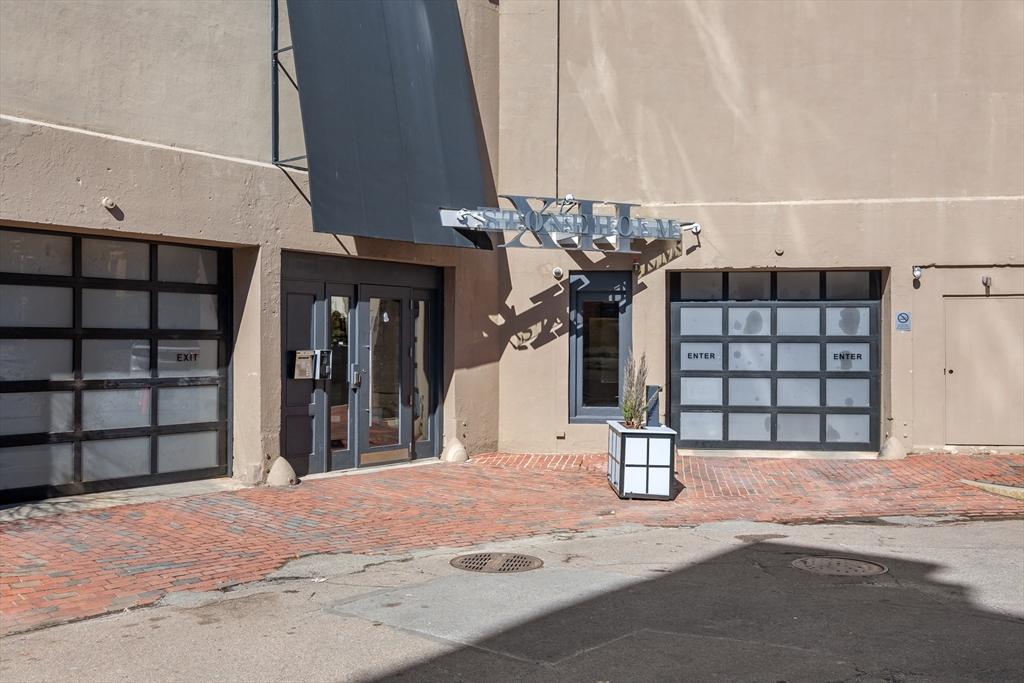 12 Stoneholm St Unit Pkg70, Boston, MA 02115 - property entrance with stucco siding