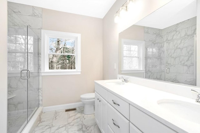 27 Willow Pond Cir Unit 27, Medway, MA 02053 - bathroom with marble look tiles, healthy amount of natural light, a marble finish shower, and baseboards