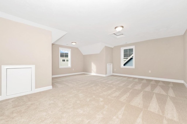 27 Willow Pond Cir Unit 27, Medway, MA 02053 - additional living space with light carpet, baseboards, and lofted ceiling