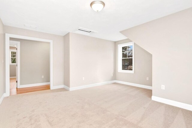 27 Willow Pond Cir Unit 27, Medway, MA 02053 - bonus room with light carpet and baseboards