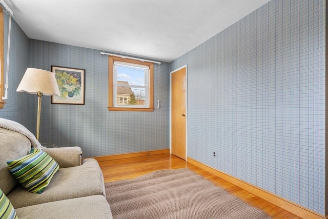 living area with light hardwood / wood-style floors