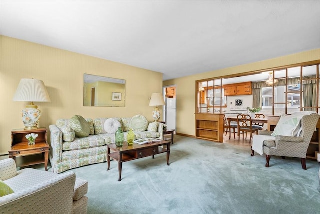 living room featuring light colored carpet