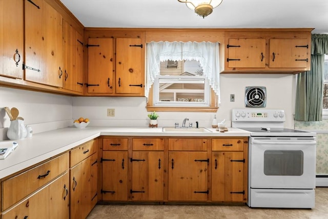 kitchen with baseboard heating, white electric range, and sink