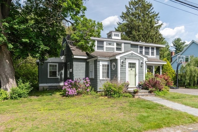 6 Willow St, Wellesley, MA 02481 - view of front of home with a front lawn and roof with shingles