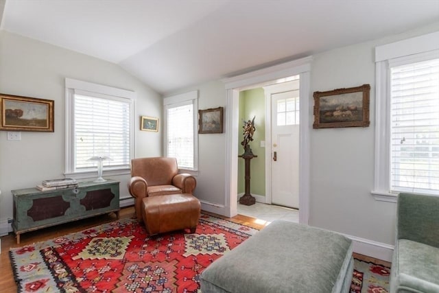 6 Willow St, Wellesley, MA 02481 - sitting room with vaulted ceiling, baseboards, and wood finished floors
