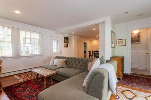 6 Willow St, Wellesley, MA 02481 - living room featuring baseboard heating, wood finished floors, a wainscoted wall, and recessed lighting