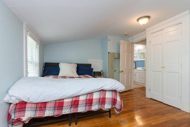 6 Willow St, Wellesley, MA 02481 - bedroom featuring wood finished floors, vaulted ceiling, and ensuite bath