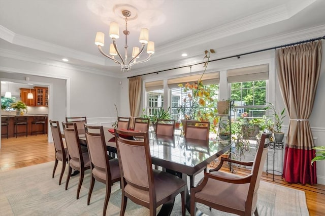 127 Shade St, Lexington, MA 02421 - dining area with plenty of natural light, a chandelier, light wood-style flooring, ornamental molding, and recessed lighting