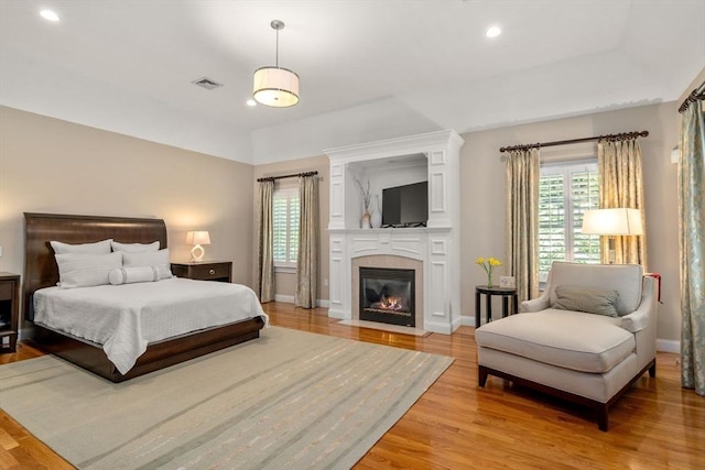 127 Shade St, Lexington, MA 02421 - bedroom featuring light wood-style floors, multiple windows, baseboards, and recessed lighting