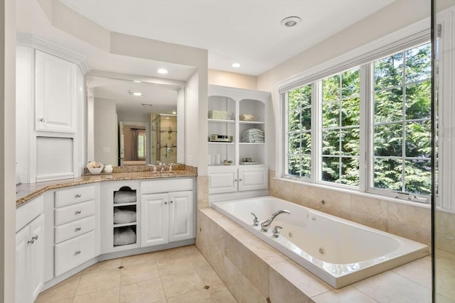 127 Shade St, Lexington, MA 02421 - bathroom with vanity, a whirlpool tub, tile patterned floors, and recessed lighting