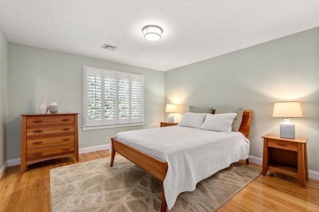 127 Shade St, Lexington, MA 02421 - bedroom with baseboards and light wood finished floors