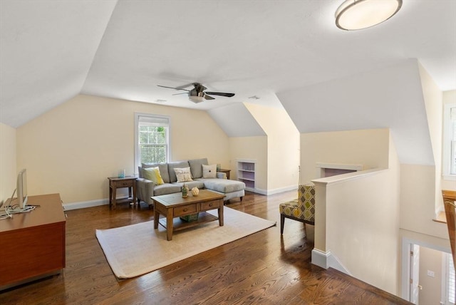 127 Shade St, Lexington, MA 02421 - living area with ceiling fan, vaulted ceiling, wood finished floors, and baseboards