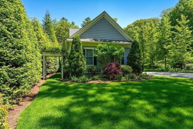 127 Shade St, Lexington, MA 02421 - view of side of home featuring a yard