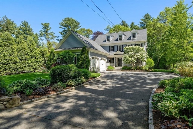 127 Shade St, Lexington, MA 02421 - view of front of home featuring driveway and an attached garage