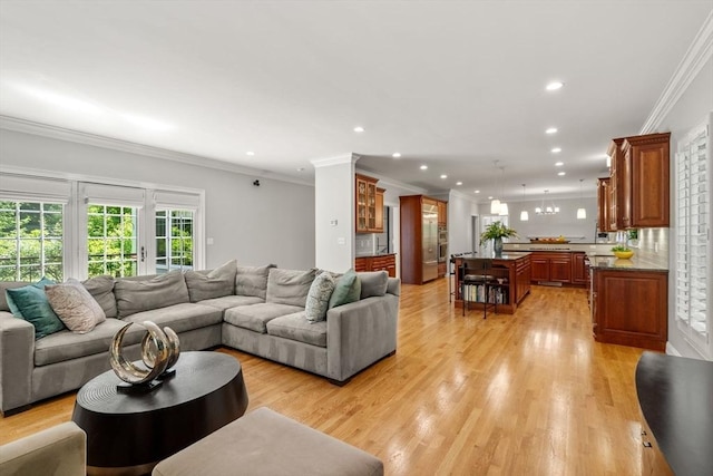 127 Shade St, Lexington, MA 02421 - living room featuring crown molding, recessed lighting, and light wood-style floors