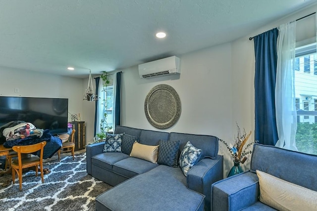 18 Emerald Ave, Webster, MA 01570 - carpeted living room with a wall mounted AC, plenty of natural light, and recessed lighting