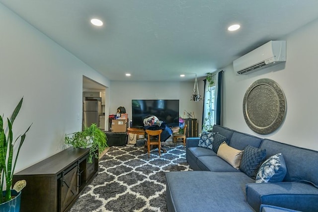 18 Emerald Ave, Webster, MA 01570 - living room featuring an AC wall unit and recessed lighting