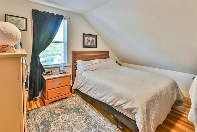 18 Emerald Ave, Webster, MA 01570 - bedroom with wood finished floors and vaulted ceiling