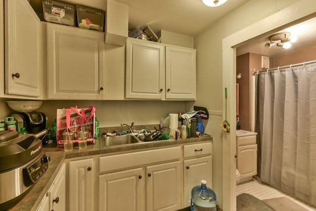 18 Emerald Ave, Webster, MA 01570 - kitchen with a sink and white cabinets