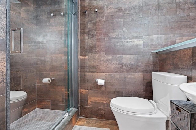 full bathroom with toilet and a shower stall