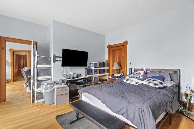 bedroom with wood finished floors
