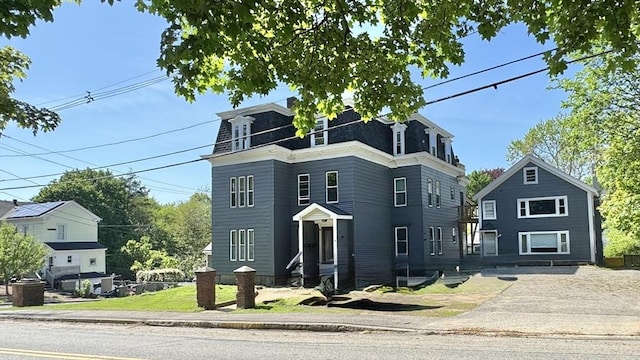 victorian home with mansard roof